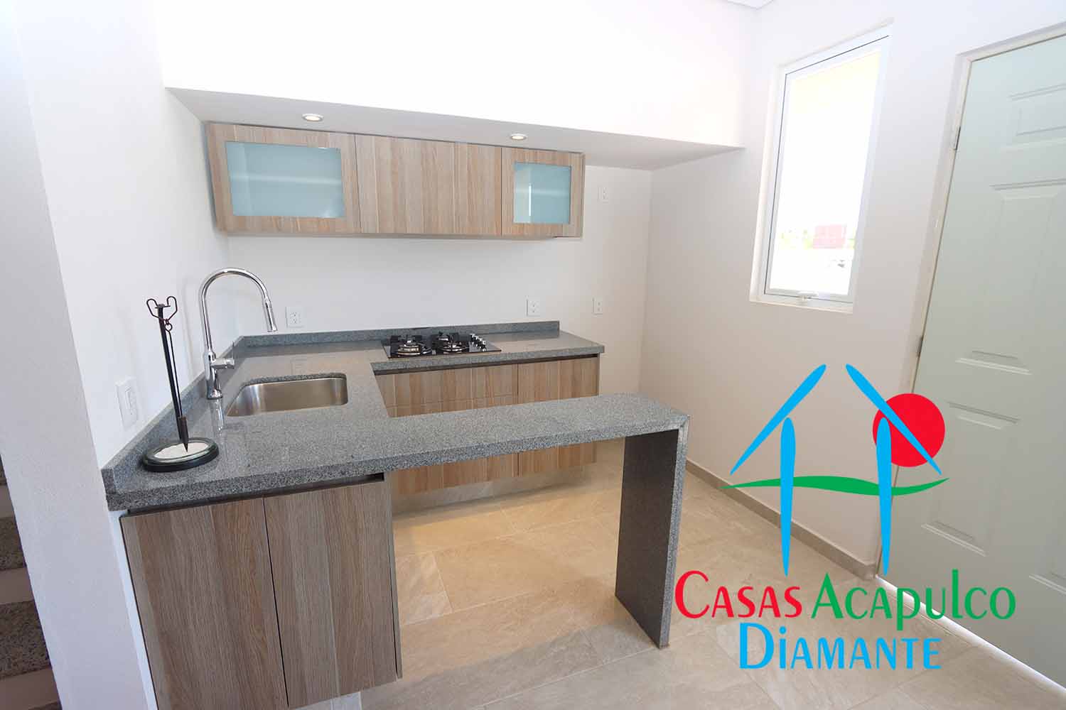 Residencial Caracol departamento muestra - Cocina 1